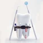What Can I Do About Sensitive Teeth? 9 Vector photo of Tooth with dental tools