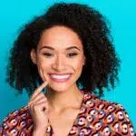 7 Warning Signs Your Dental Crown Needs Replacement 9 Photo of shiny attractive lady smiling